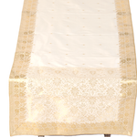 Cream silk table runner running down a dining table