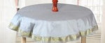 Gray sari tablecloth laid on a dining table