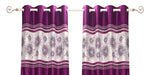 Wine sari grommet top curtains hung at a window