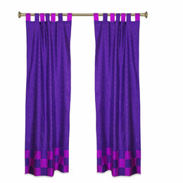 Lavender sari tab top curtains hung at a window