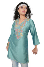 Green art silk kurti tunic shown draped on a model