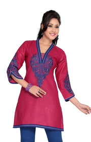Hot pink sari kurti tunic shown draped on a model