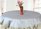 Gray sari tablecloth laid on a dining table