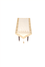 Cream silk table runner running down a dining table