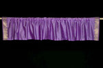 Lavender sari valance mounted above a window