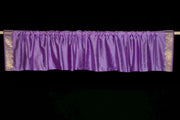Lavender sari valance mounted above a window