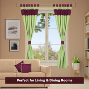 Olive green raw silk curtain and cushion cover set shown together