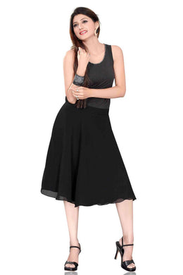 Black georgette pleated skirt shown draped on a model