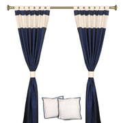 Cream raw silk curtain and cushion cover set shown together