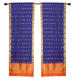 Blue sari rod pocket curtains hung at a window