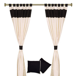 Cream raw silk curtain and cushion cover set shown together