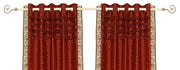 Rust sari grommet top curtains hung at a window
