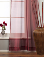 Maroon sheer tissue rod pocket curtains hung at a window
