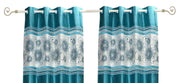 Turquoise sari grommet top curtains hung at a window