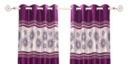 Wine sari grommet top curtains hung at a window