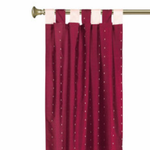 Maroon sari tab top curtains hung at a window