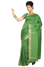 Forest green art silk sari shown draped on a model