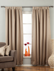 Gray sari tab top curtains hung at a window