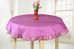 Calming lavender sari tablecloth laid on a dining table