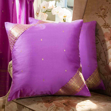 Calming lavender sari cushion covers arranged on a sofa