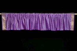 Lavender sari valance mounted above a window