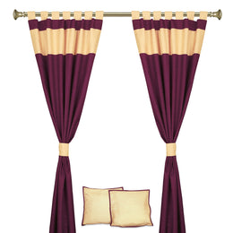 Maroon raw silk curtain and cushion cover set shown together