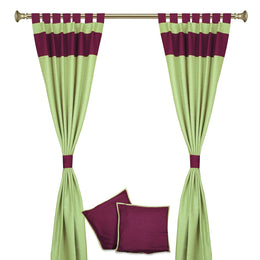 Olive green raw silk curtain and cushion cover set shown together