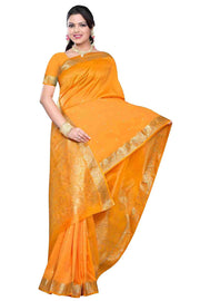 Pumpkin art silk sari shown draped on a model