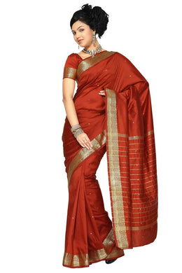 Rust art silk sari shown draped on a model
