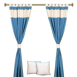 Turquoise raw silk curtain and cushion cover set shown together