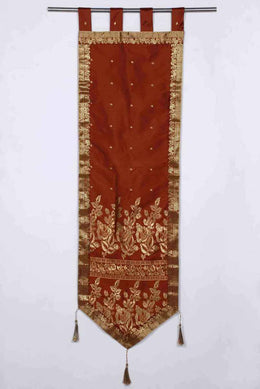 Brown sari wall hanging displayed on a wall